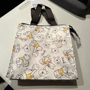 Disney Small lunch bag or bag for other items.  Pooh bear